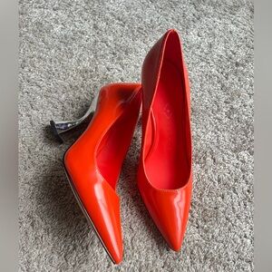 Katy Perry Collections. New without tags. Size 7.5 . Vibrant Orange Heels